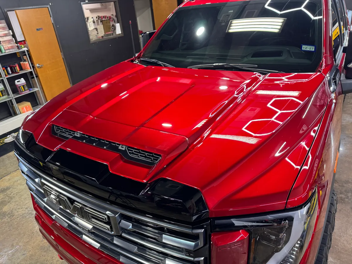 Red Dodge Challenger in the Protektd studio, Dallas