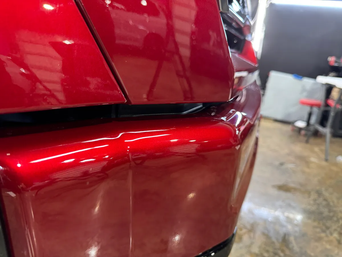 Red Dodge Challenger in the Protektd studio, Dallas