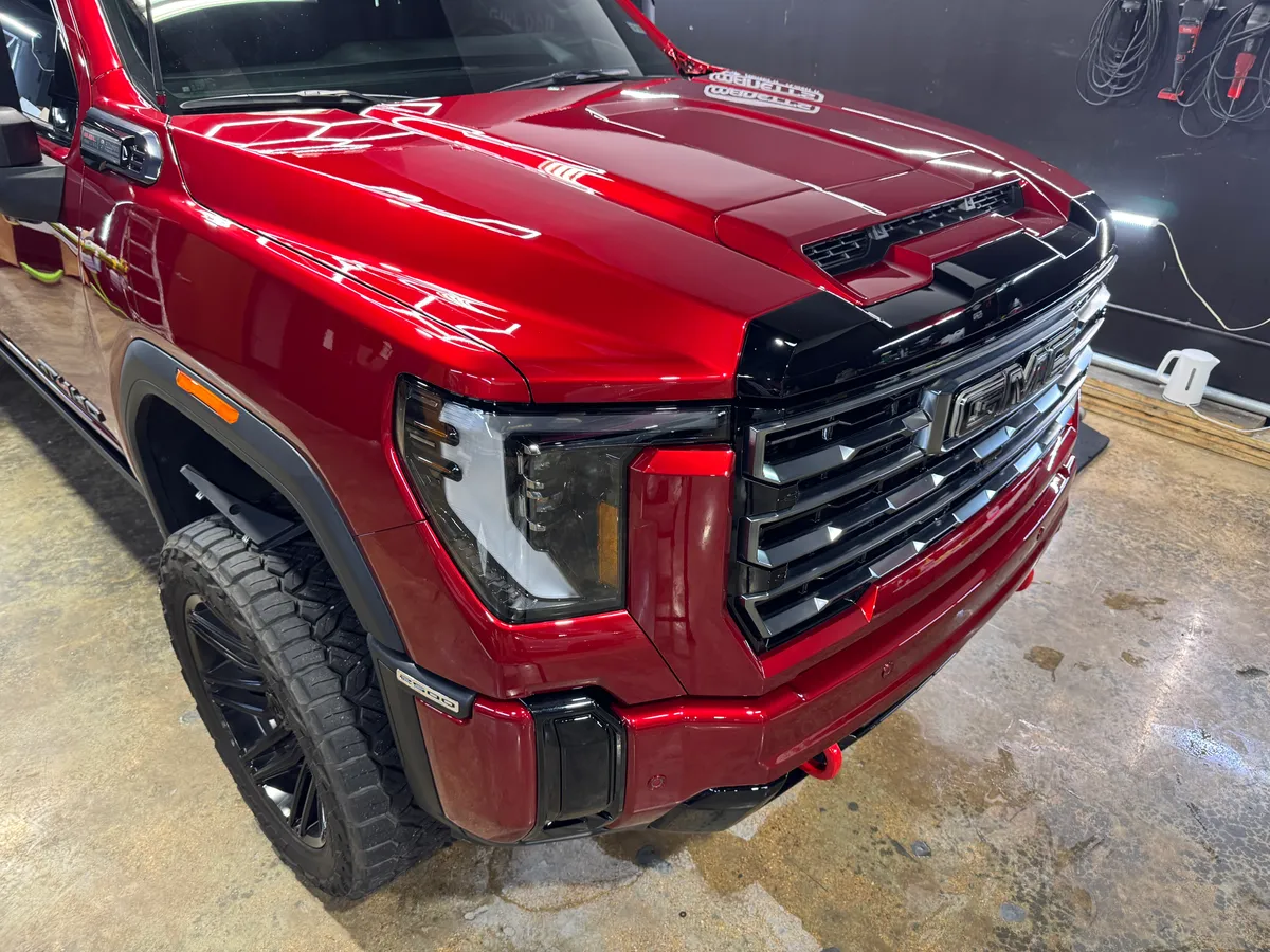 Red Ford F-150 in for protection at Protektd Detailing, Dallas