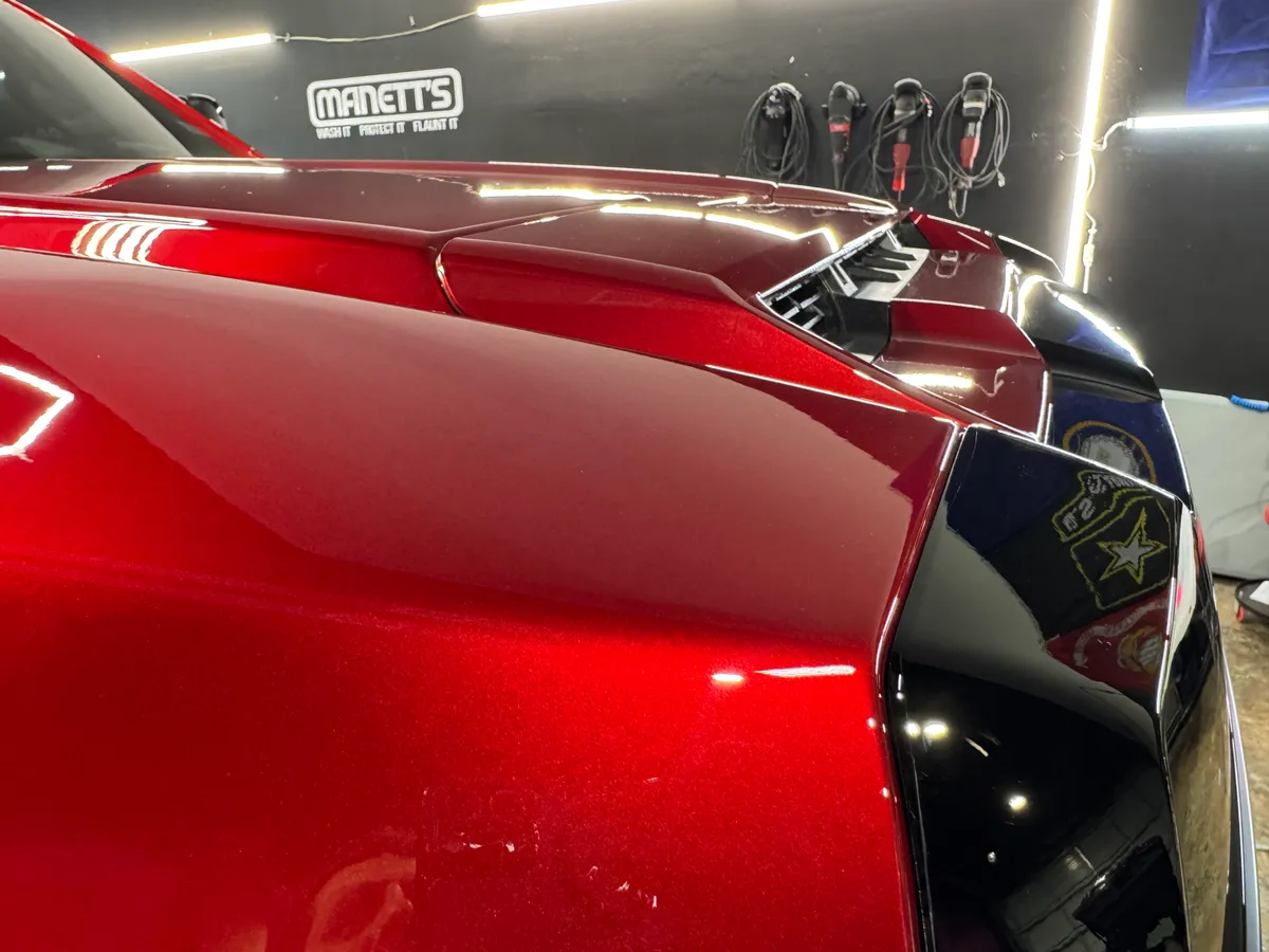 Red Dodge Challenger in the Protektd studio, Dallas