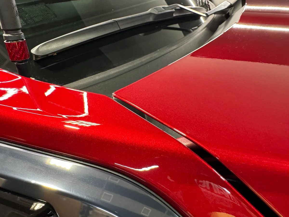 Red Dodge Challenger in the Protektd studio, Dallas