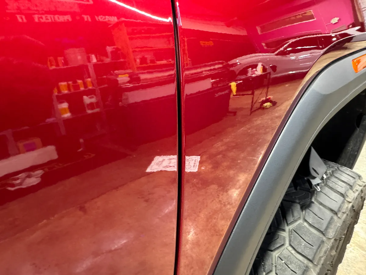 Red Dodge Challenger in the Protektd studio, Dallas