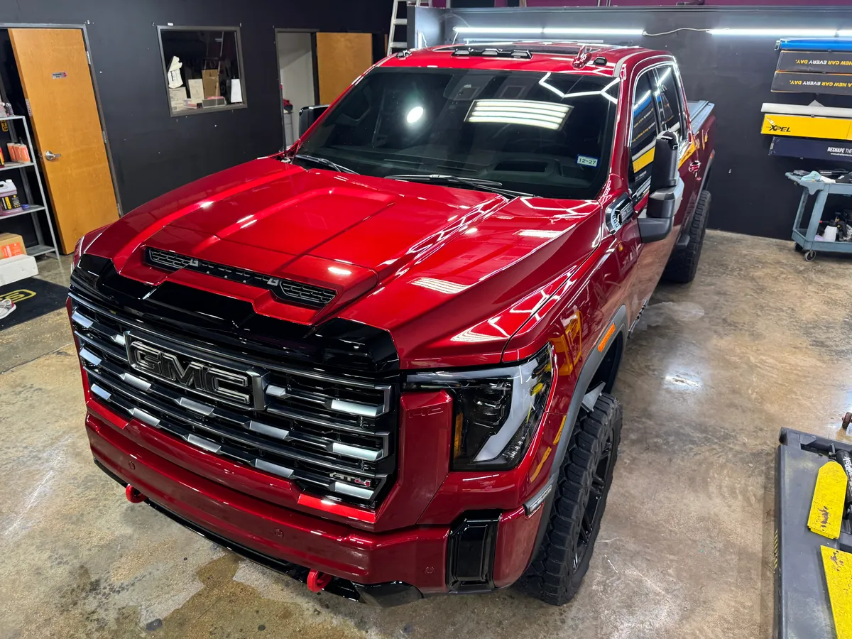 Red Ford F-150 in for protection at Protektd Detailing, Dallas