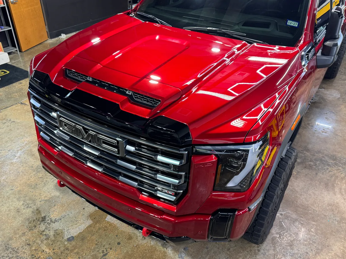 Red Ford F-150 in for protection at Protektd Detailing, Dallas