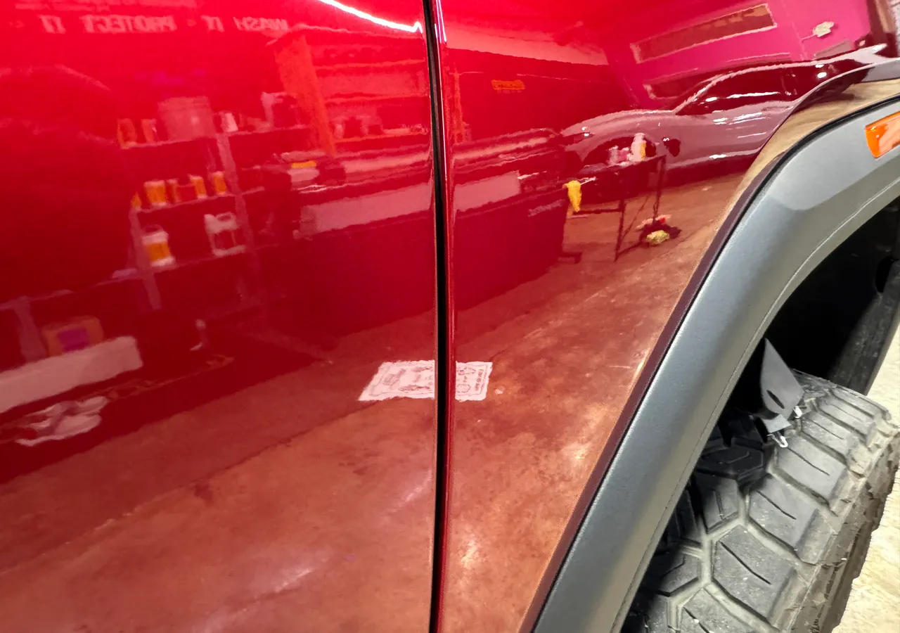 Red Dodge Challenger, hood detail at Protektd Detailing, Dallas
