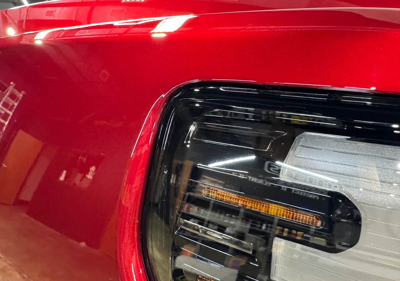 Wheel and brake-caliper detail at Protektd Detailing, Dallas