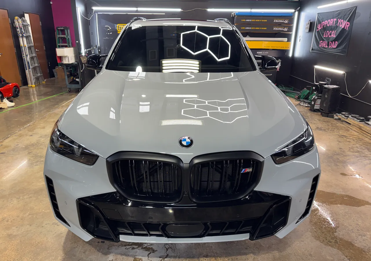 White luxury SUV, coated finish at Protektd Detailing, Dallas