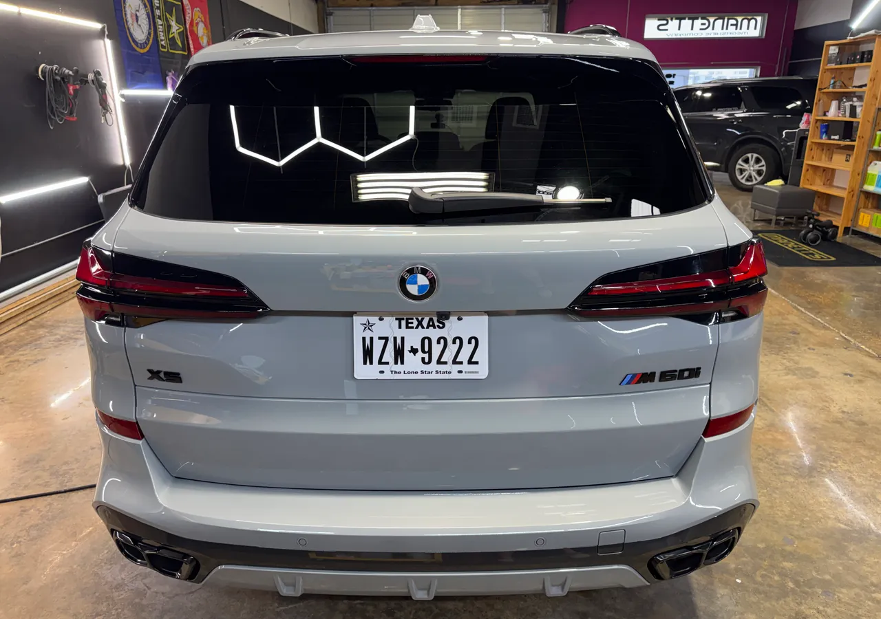 White luxury SUV, full detail at Protektd Detailing, Dallas