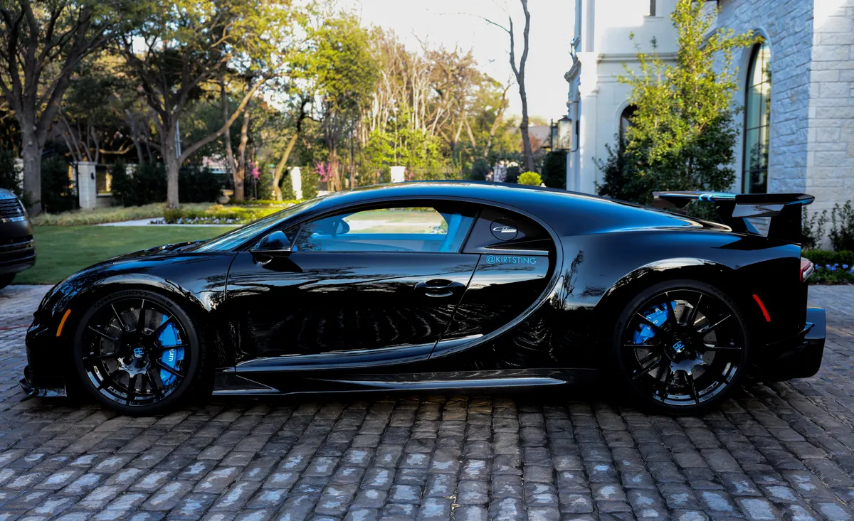Black Bugatti Chiron with a ceramic-coated finish on cobblestone — Protektd Detailing, Dallas