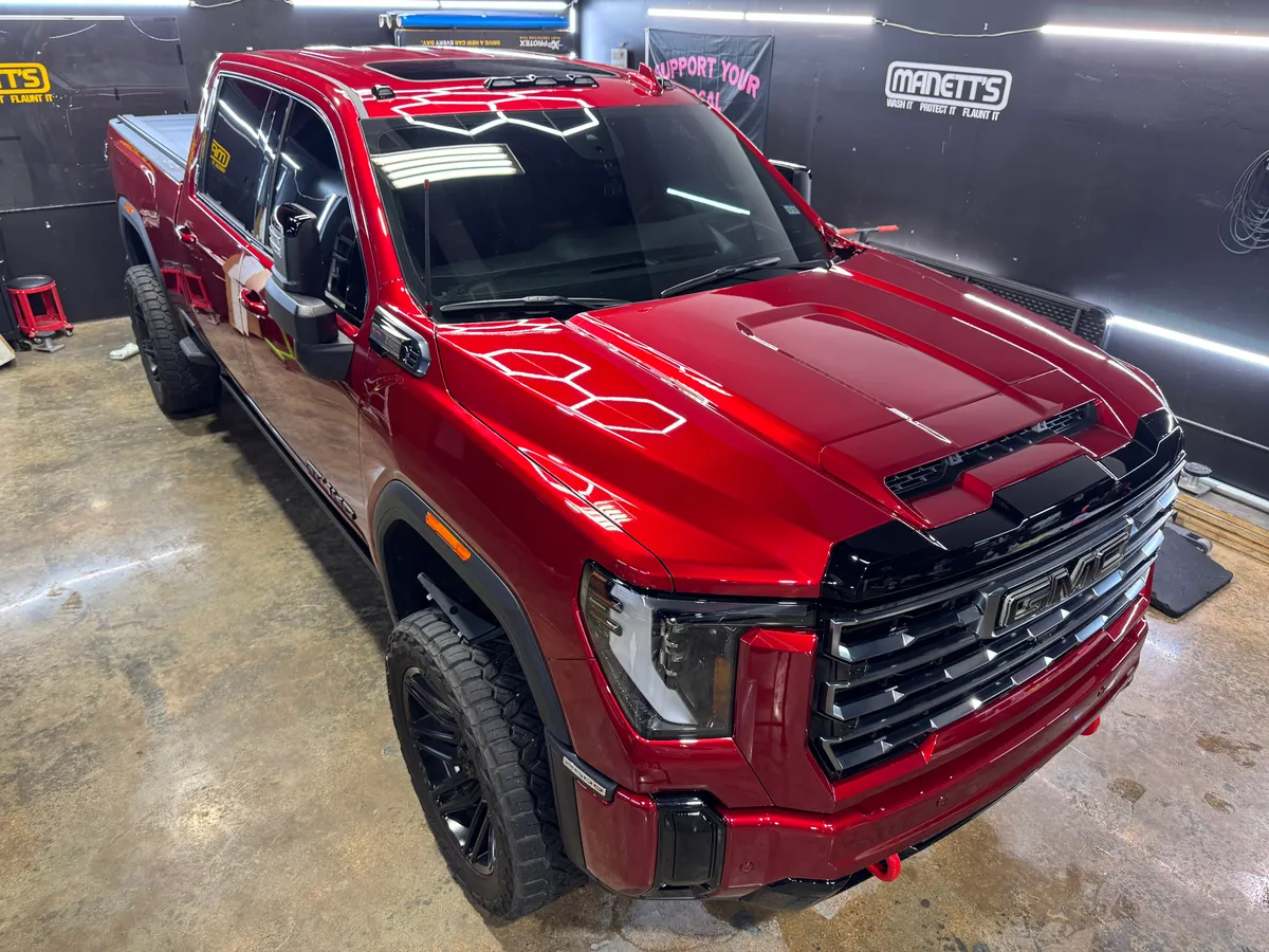 Red Ford F-150 in for paint protection at Protektd Detailing, Dallas